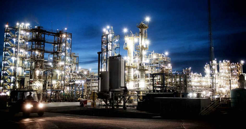 REC Silicon’s fluidized bed reactor polysilicon plant in Moses Lake, Washington with vehicle at night